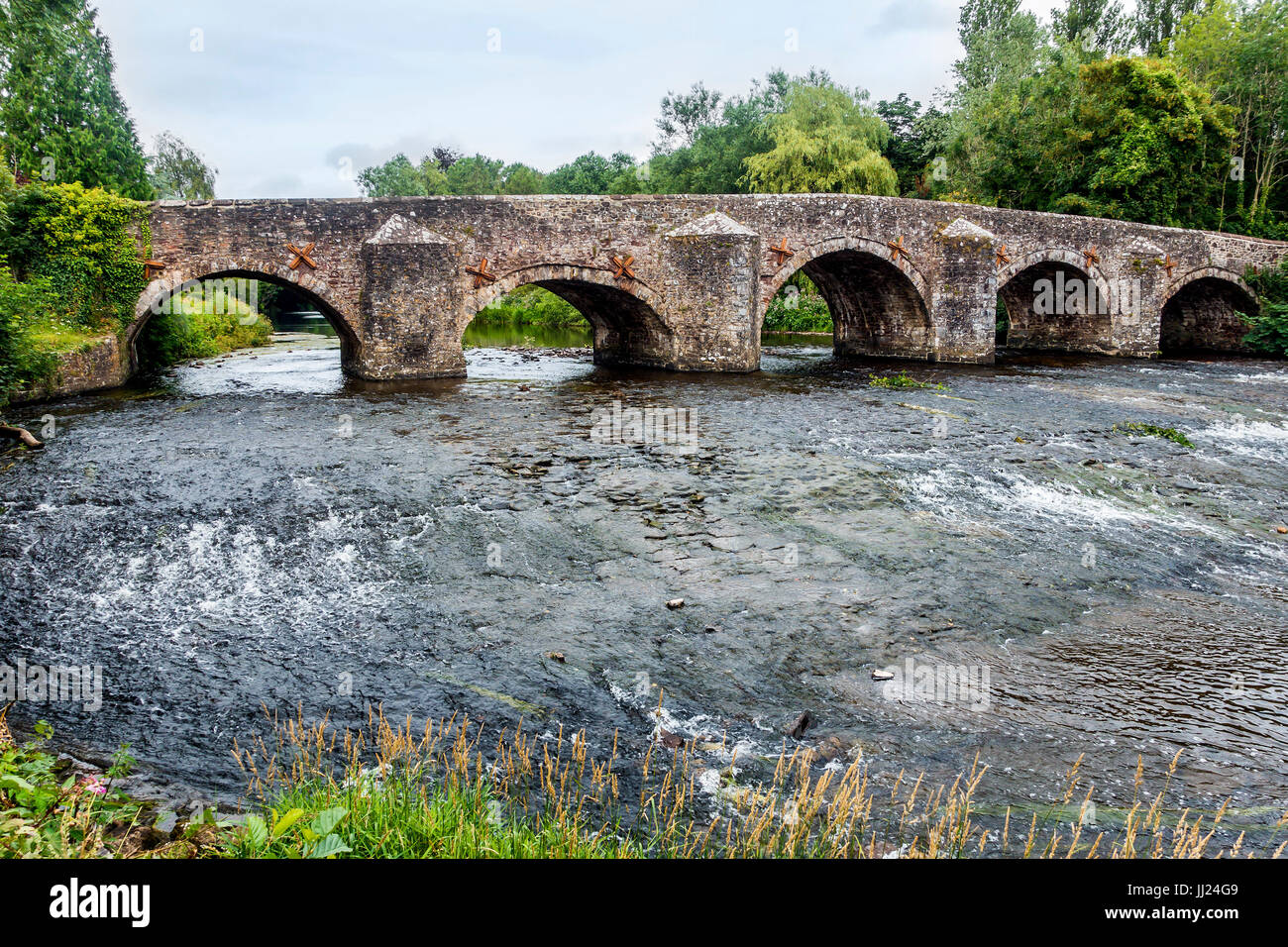 Medieval Bridge crossing the River Exe at Bickleigh Devon. A five arch stone bridge crossing the river Exe below Tiverton, built in 1809 and listed Gr Stock Photo
