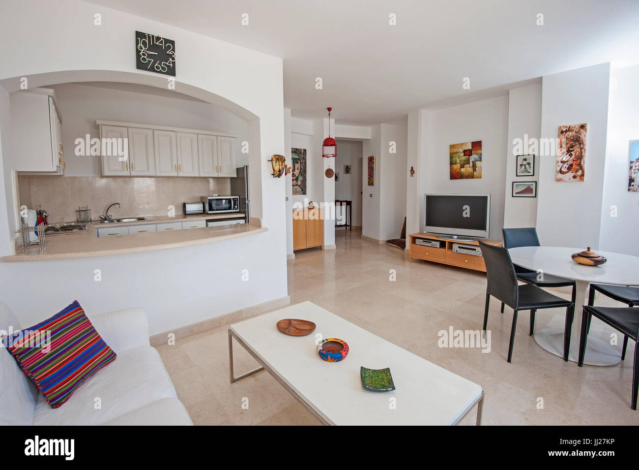 Kitchen lounge and dining area in luxury apartment show home showing ...