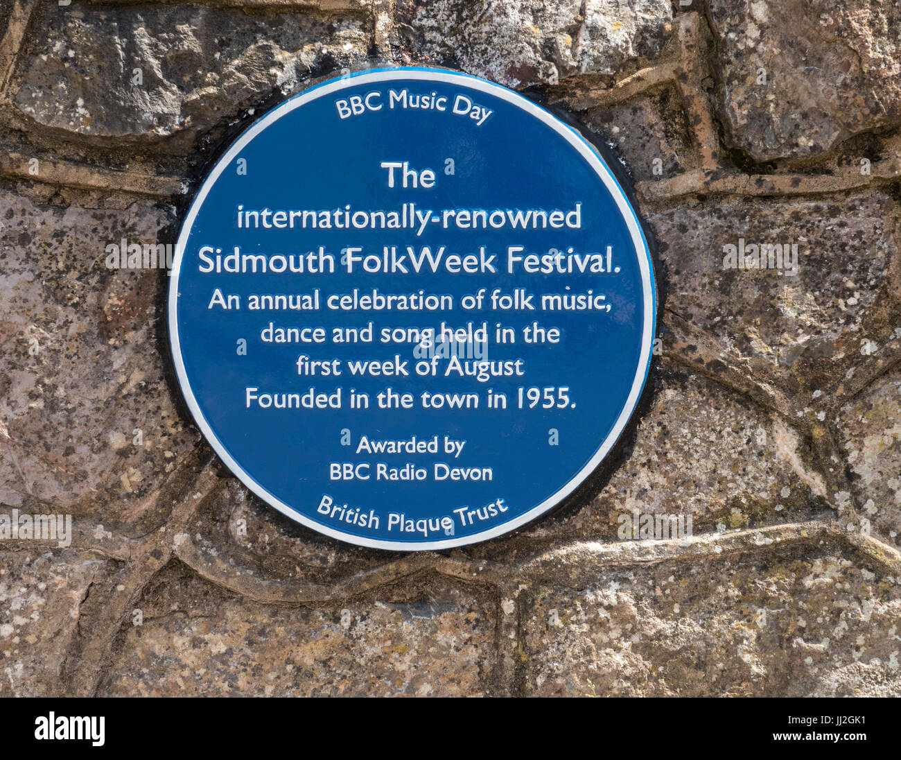 Blue plaque commemorating Sidmouth Folk Week, awarded by BBC Radio Devon, the plaque is located on the Ham area. Stock Photo