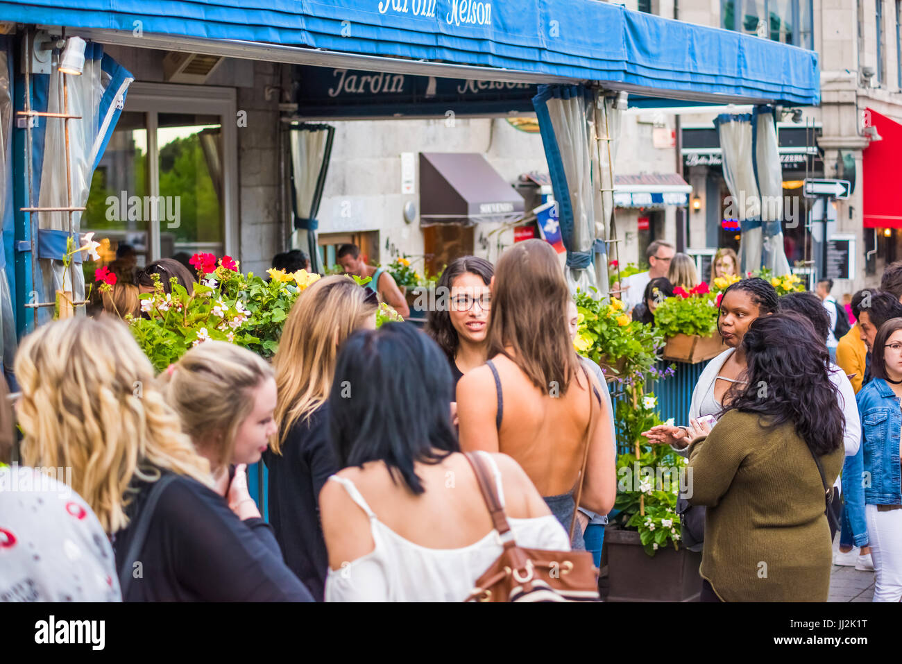 Montreal, Canada - May 27, 2017: Old town area Jacques Cartier square with people waiting in line queue outside restaurant called Jardin Nelson during Stock Photo