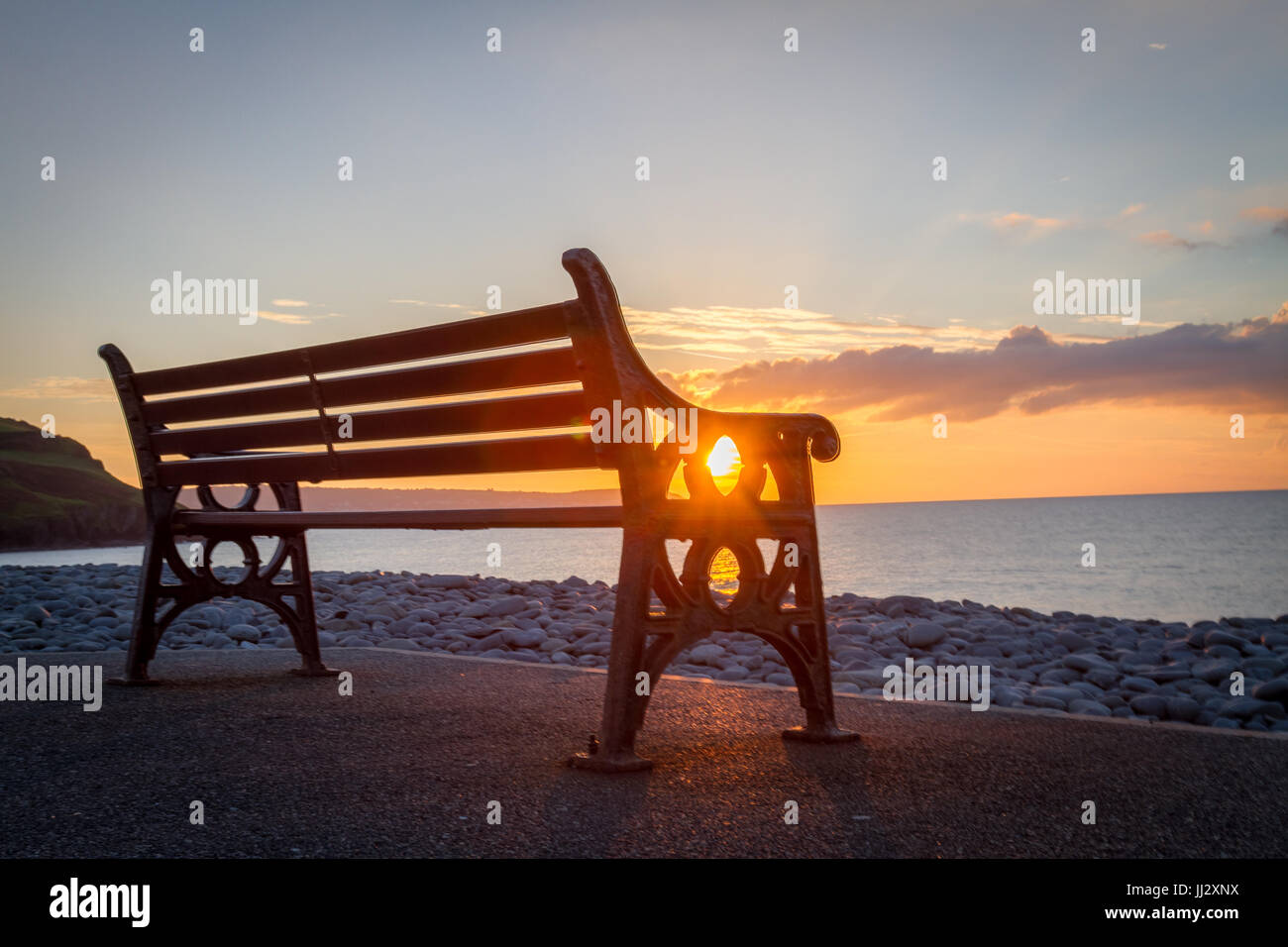 Bench with a beautiful view of the sunset at Aberaeron Stock Photo