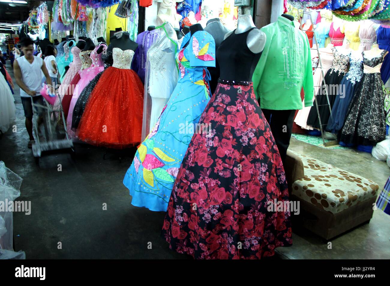Philippines. 17th July, 2017. Various designed of dress and gown on display  in different stores at Divisoria Market in Ylaya Street. Manila City on  July 17, 2017. Divisoria Market is the heaven