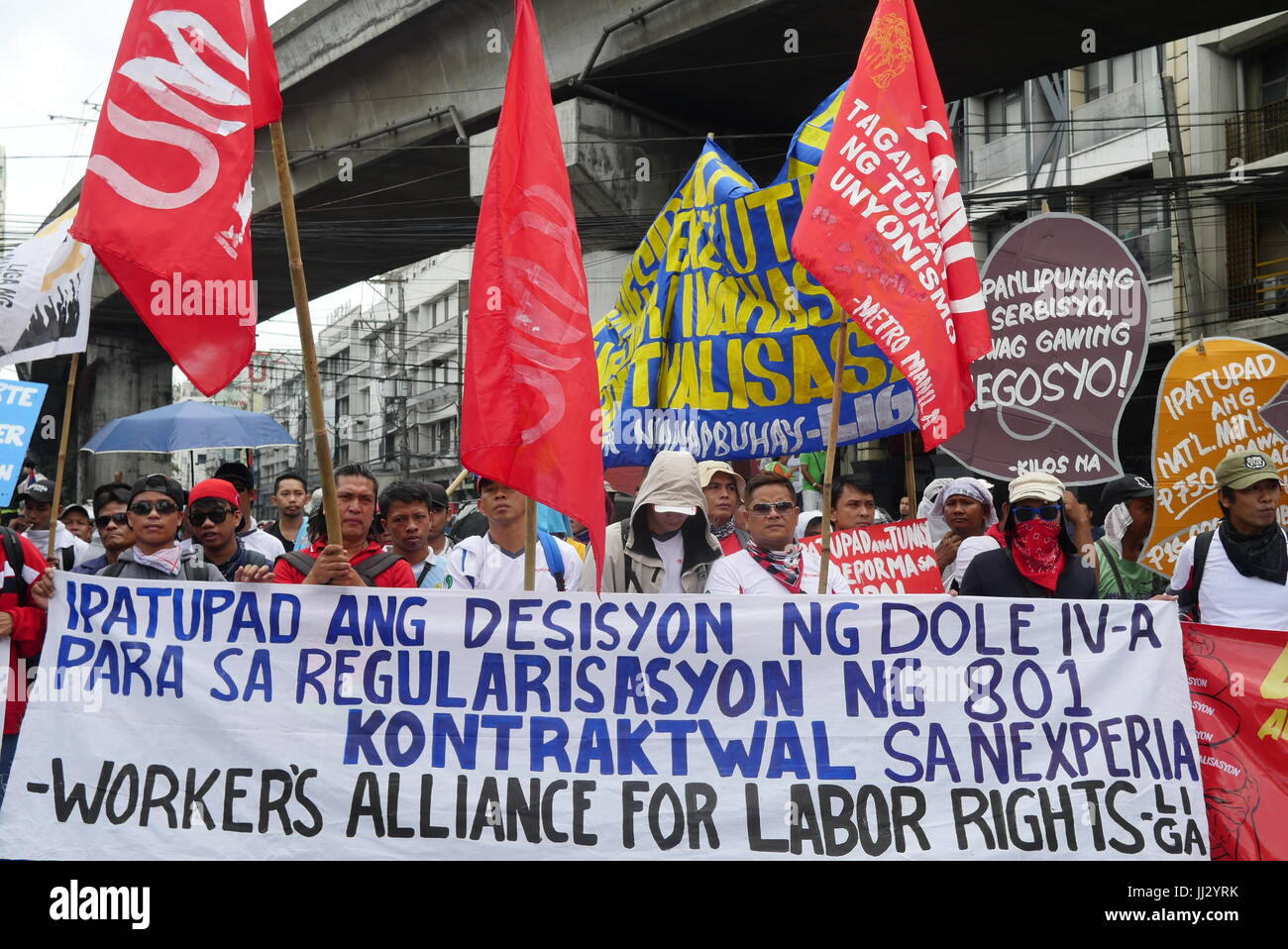 Shouting out regularization of workers. Protest against jeepney phase out led by the PISTON and joined by workers who is against 'Endo', end of contrast. Stock Photo