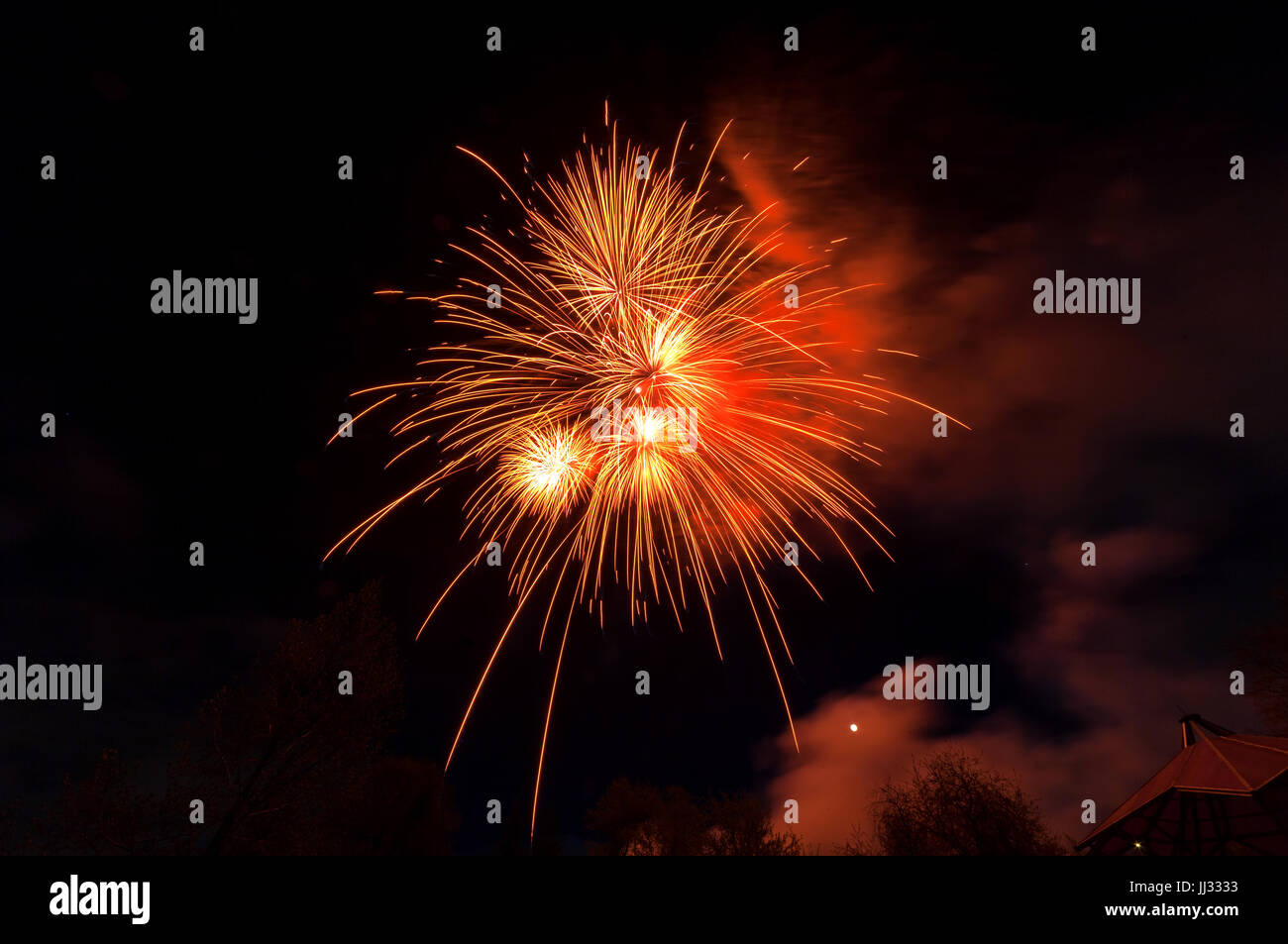 Fireworks light up close-up against dark sky Stock Photo