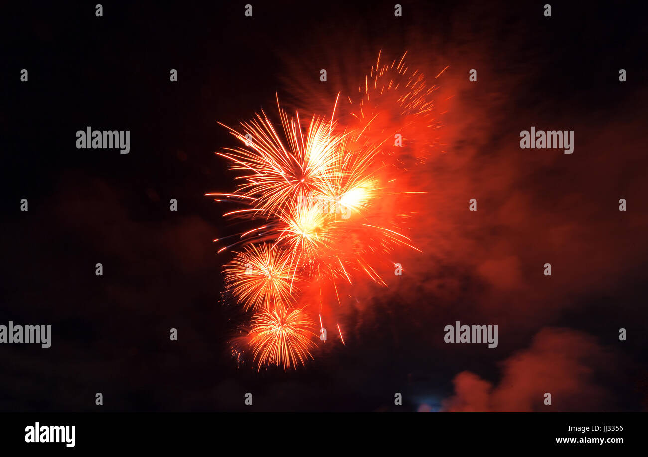 Fireworks light up close-up against dark sky Stock Photo