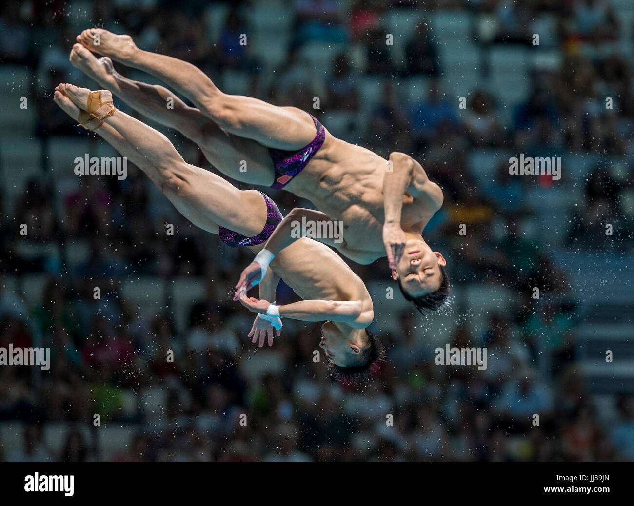 Budapest, Hungary. 17th July, 2017. Aisen Chen and Hat Yang of China winning at the men's 10m platform synchro final of the Fina World Championships in Budapest, Hungary, 17 July 2017. Photo: Jens Büttner/dpa-Zentralbild/dpa/Alamy Live News Stock Photo