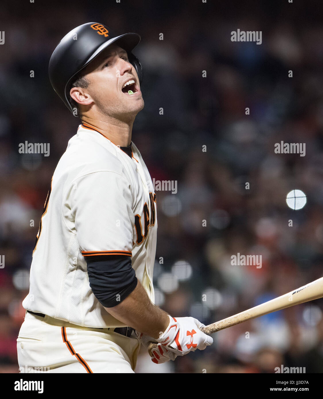 San Francisco, California, USA. 17th July, 2017. With two outs in the bottom of the ninth inning, San Francisco Giants catcher Buster Posey (28) watches his ball go foul, during a MLB baseball game between the Cleveland Indians and the San Francisco Giants at AT&T Park in San Francisco, California. Valerie Shoaps/CSM/Alamy Live News Stock Photo