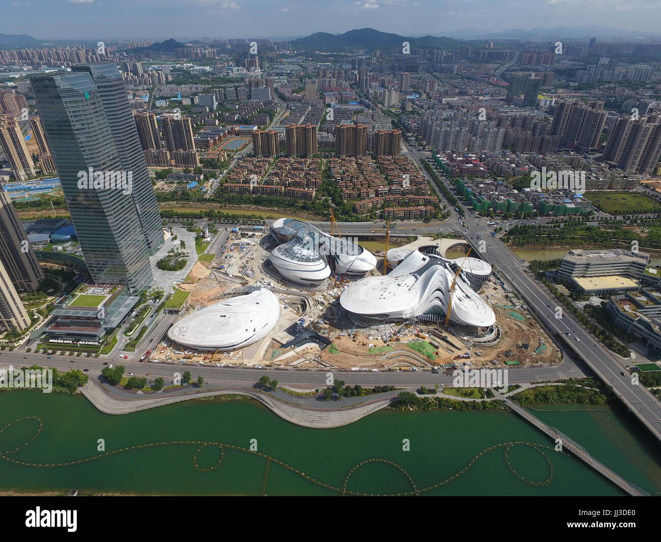 Changsha. 18th July, 2017. Photo taken on July 18, 2017 shows the construction site of Meixi Lake International Culture and Arts Center in Changsha, capital of central China's Hunan Province. Credit: Long Hongtao/Xinhua/Alamy Live News Stock Photo