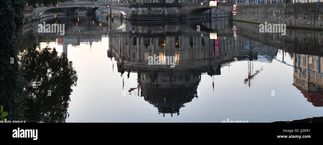 Berlin, Germany. 18th July, 2017. The Bode Museum is reflected in the river Spree in Berlin, Germany, 18 July 2017. The building was opened in 1904 and originally housed the Kaiser Friedrich Museum. It is one of several museums on the historical 'Museum Island' in Central Berlin, an area listed as a world cultural heritage site by UNESCO. The Bode currently houses a sculpture collection and a collection of Byzantine art and coinage. Photo: Paul Zinken/dpa/Alamy Live News Stock Photo