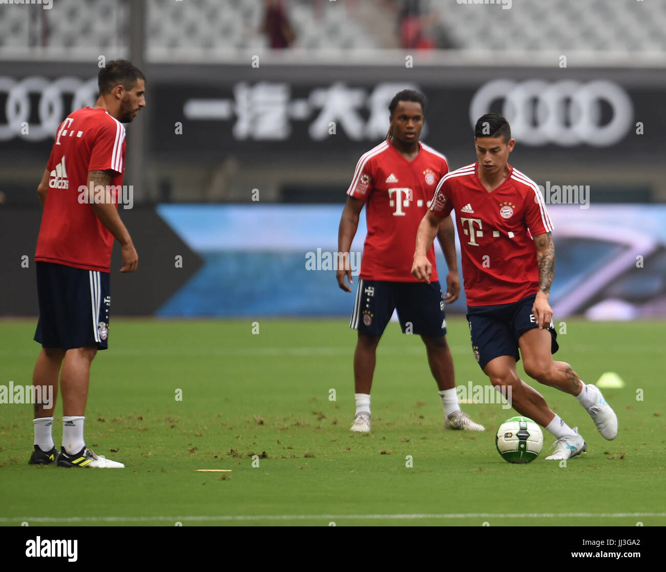 Shanghai, China. 18th July, 2017. James Rodriguez of Bayern Munich (R) attends a training session prior to the 2017 International Champions Cup China against Arsenal in Shanghai, China, July 18, 2017. Credit: Jia Yuchen/Xinhua/Alamy Live News Stock Photo