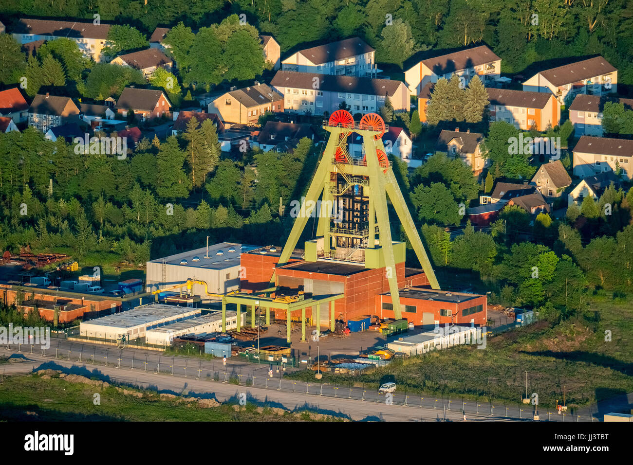 Winding tower of the former coal mine Haus Aden, evening light, Bergkamen, Ruhr area, North Rhine-Westphalia, Germany Stock Photo