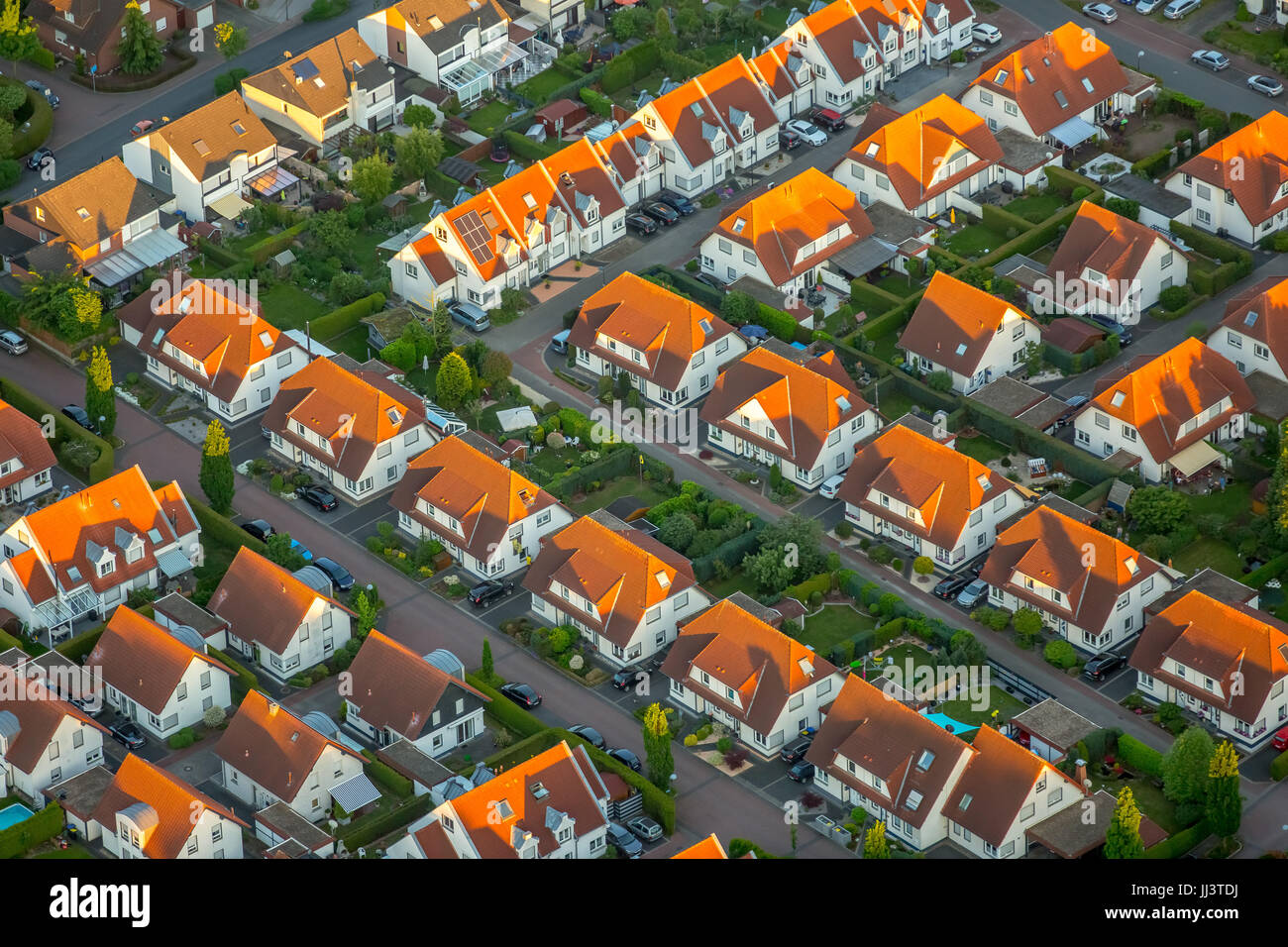 Residential area Weidenweg, semi-detached houses, estate of terraced houses, residential property, red tile roofs, Bergkamen Stock Photo