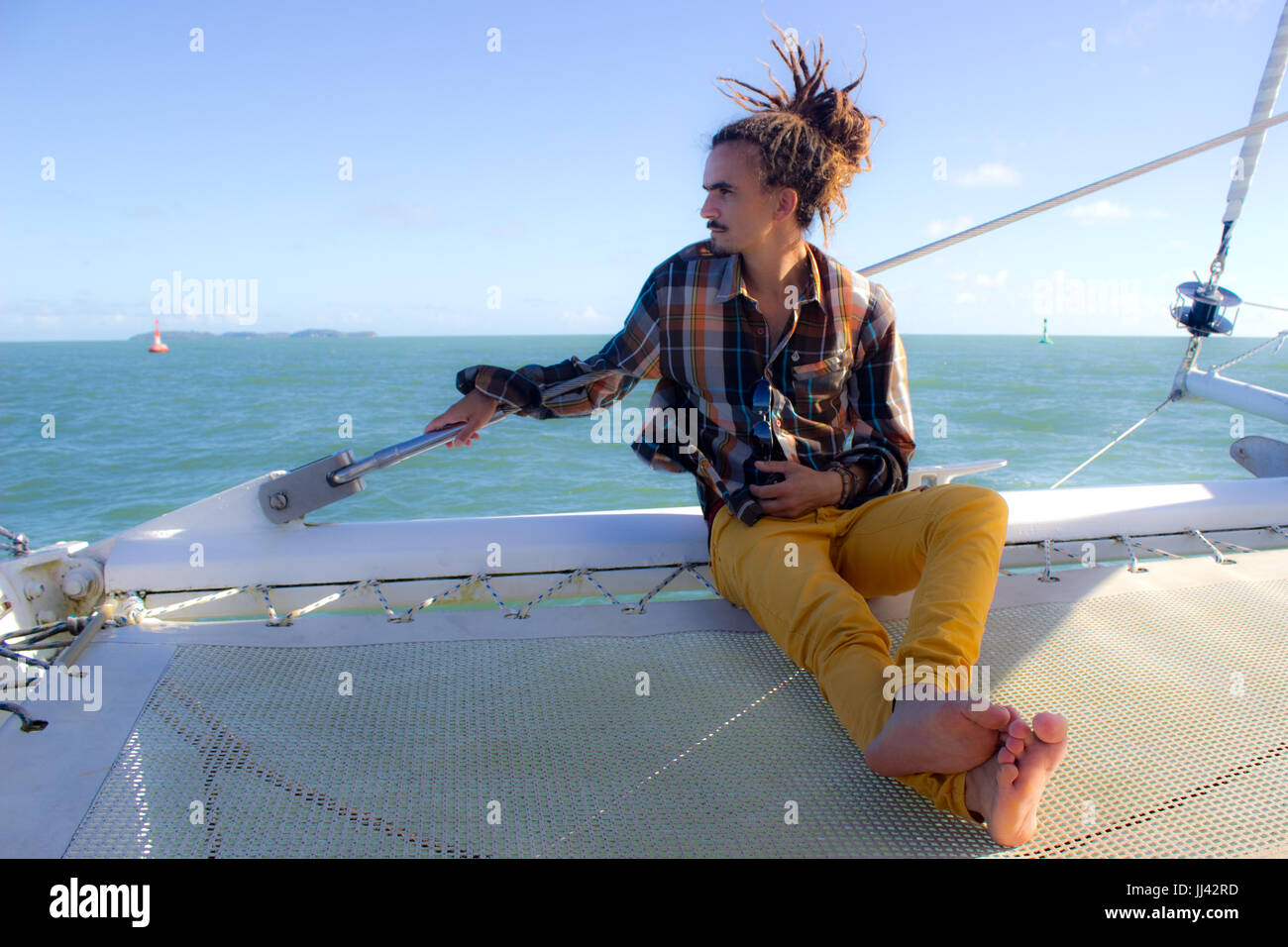 A man sailing to Salvation's islands. Stock Photo
