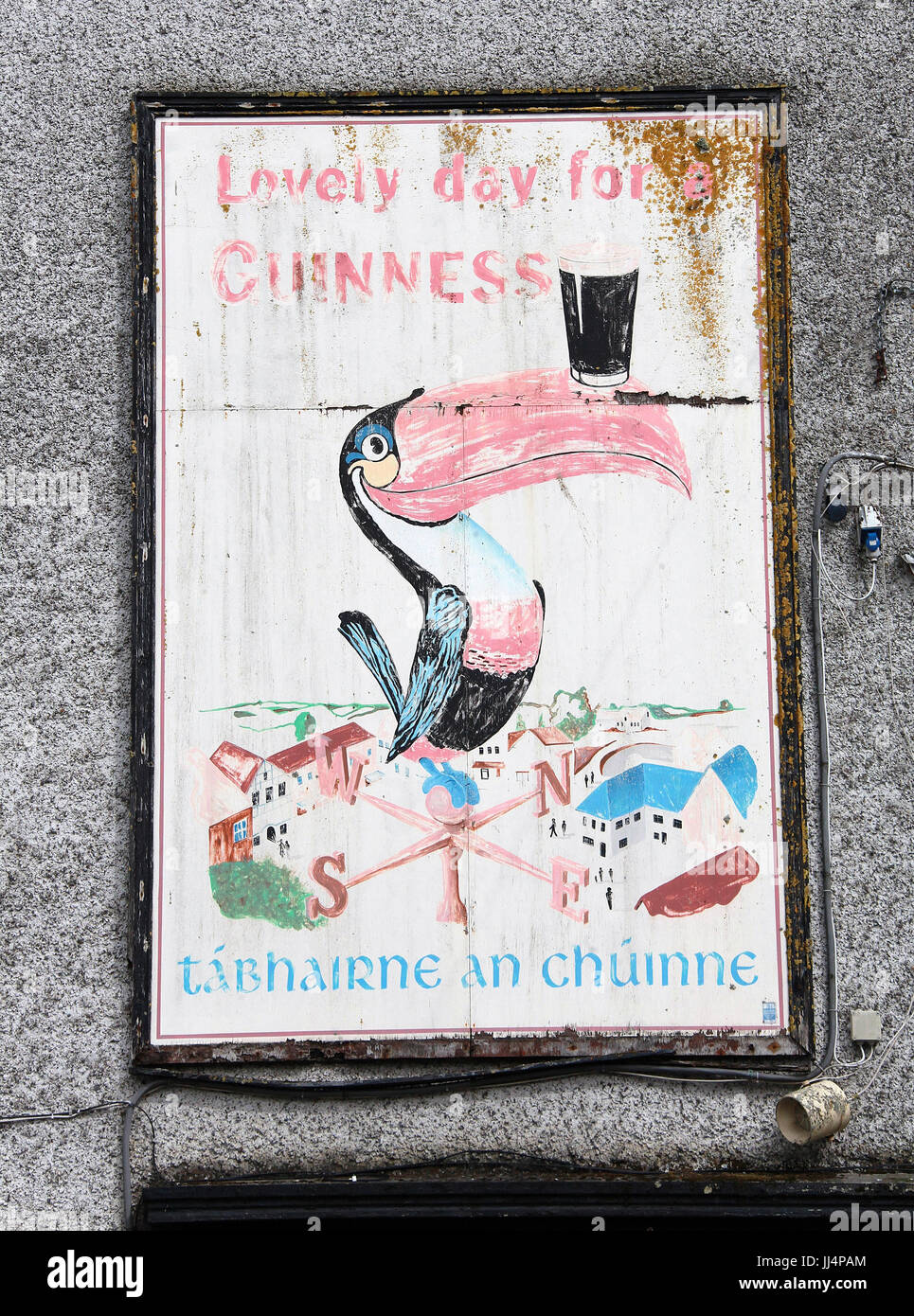 Old Guinness Advertisment in Skibbereen Stock Photo