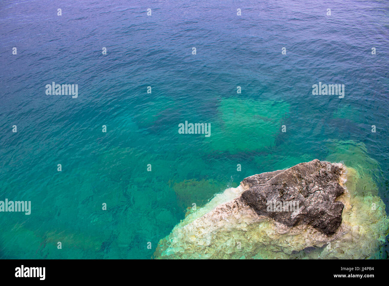 Pitted Lake Rocks Rocks in a lake Stock Photo - Alamy