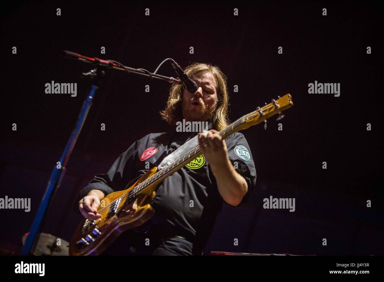 Milan, Italy. 17th July, 2017. Tim Kingsbury of the canadian indie rock band Arcade Fire pictured on stage as they perform at Milano Summer Festival, Ippodromo San Siro Milan. Credit: Roberto Finizio/Pacific Press/Alamy Live News Stock Photo