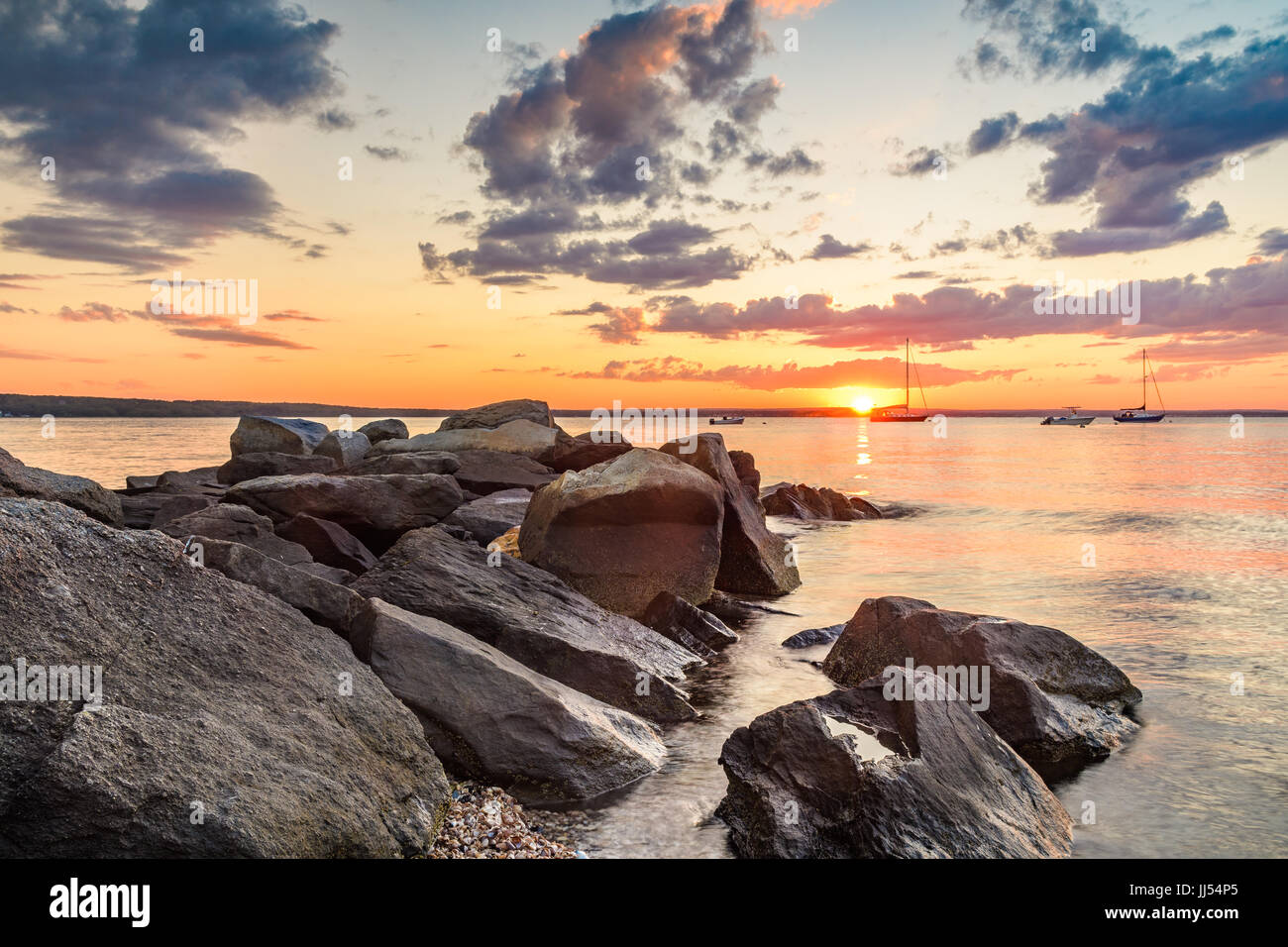 Sunset on the jetty in Jamestown, Rhode Island Stock Photo