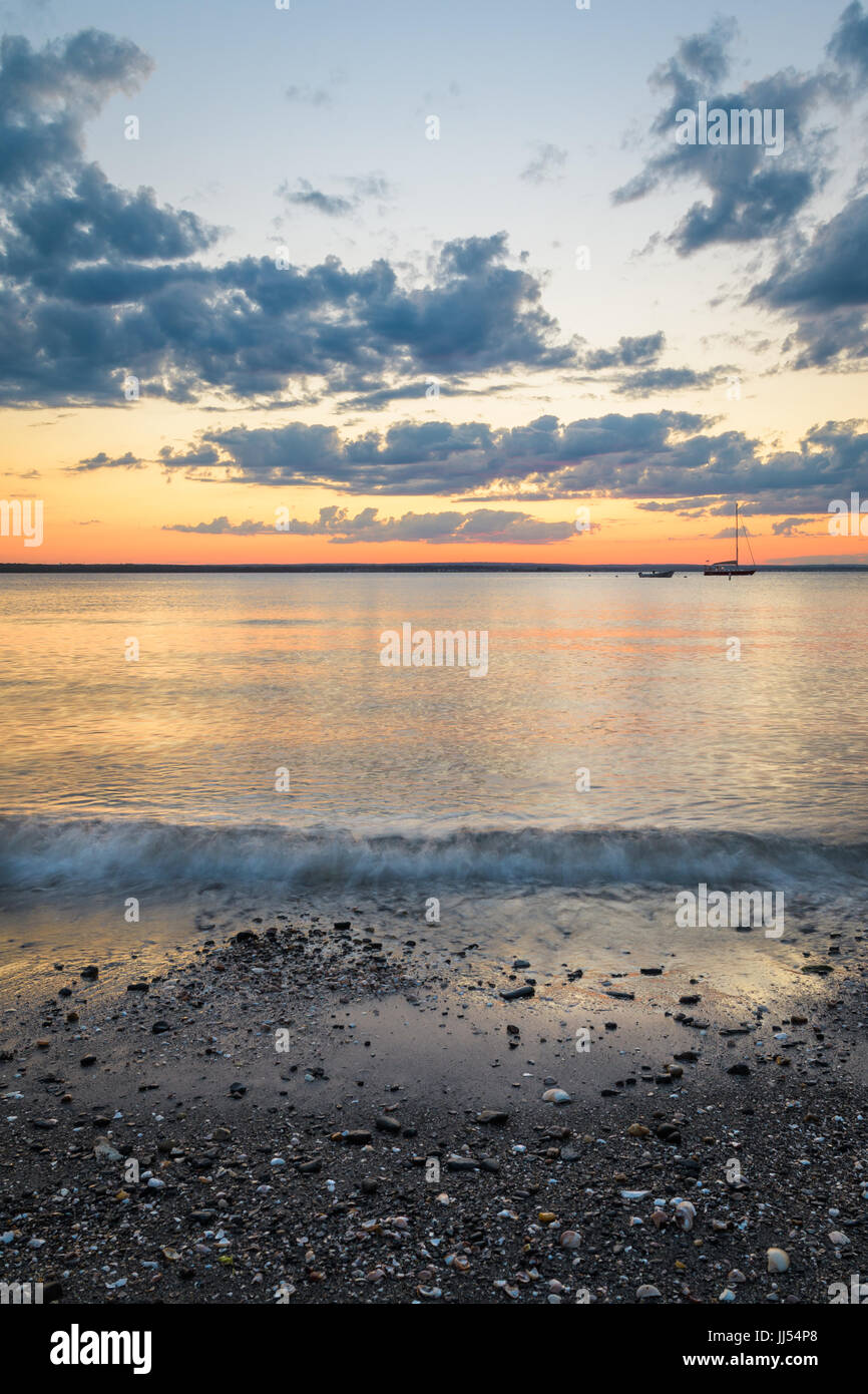Sunset and waves on Jamestown, Rhode Island Stock Photo
