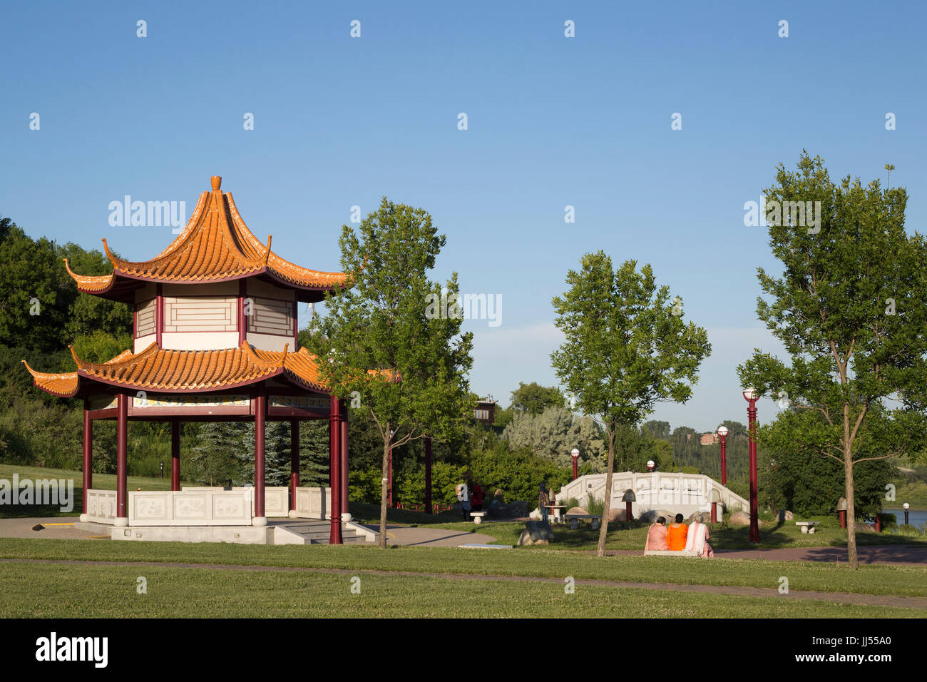 Chinese Garden pavilion at Louise McKinney Park in Edmonton river valley with clear blue sky, Alberta, Canada Stock Photo