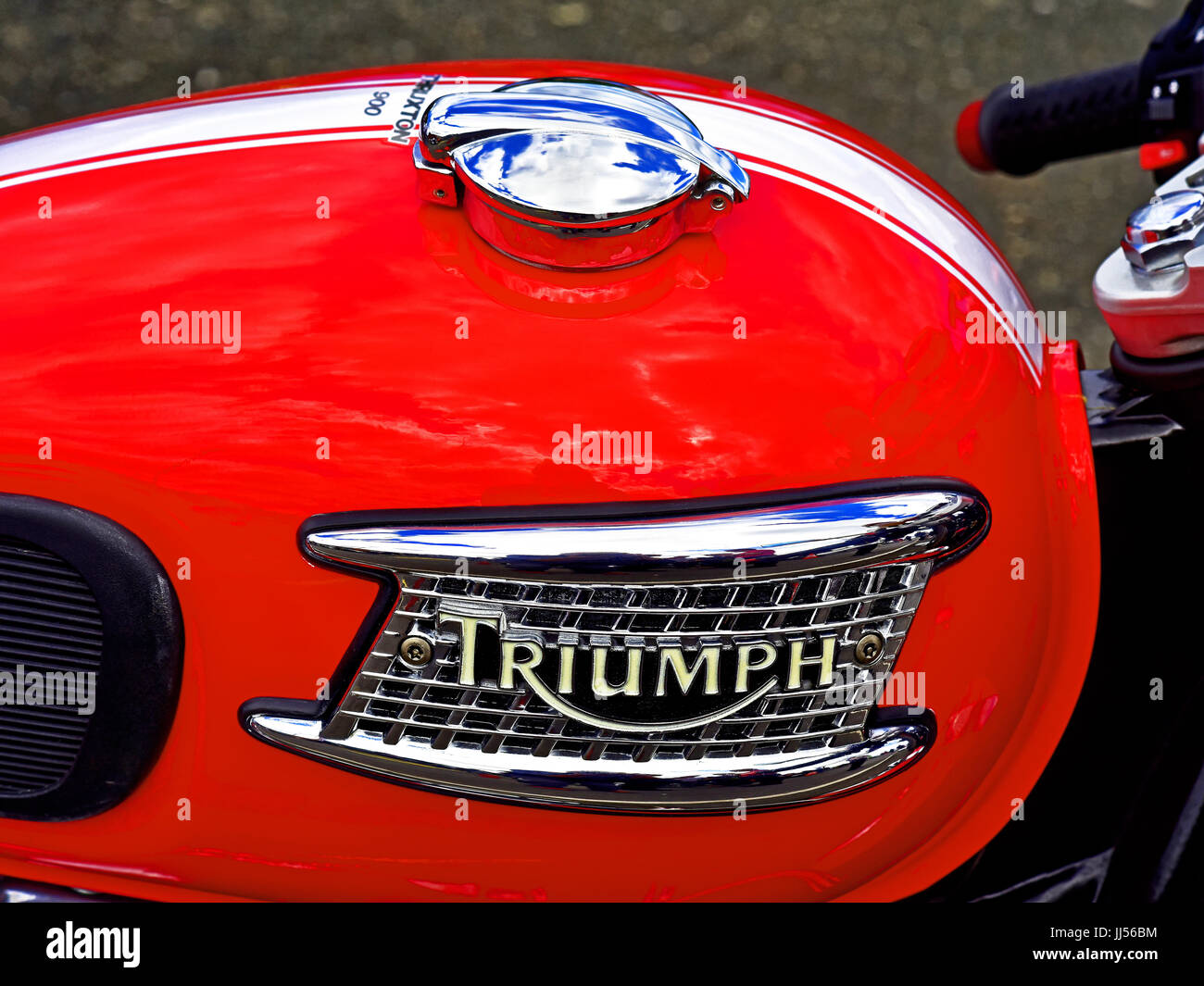 Red Triumph Bonneville motorbike petrol tank Stock Photo Alamy