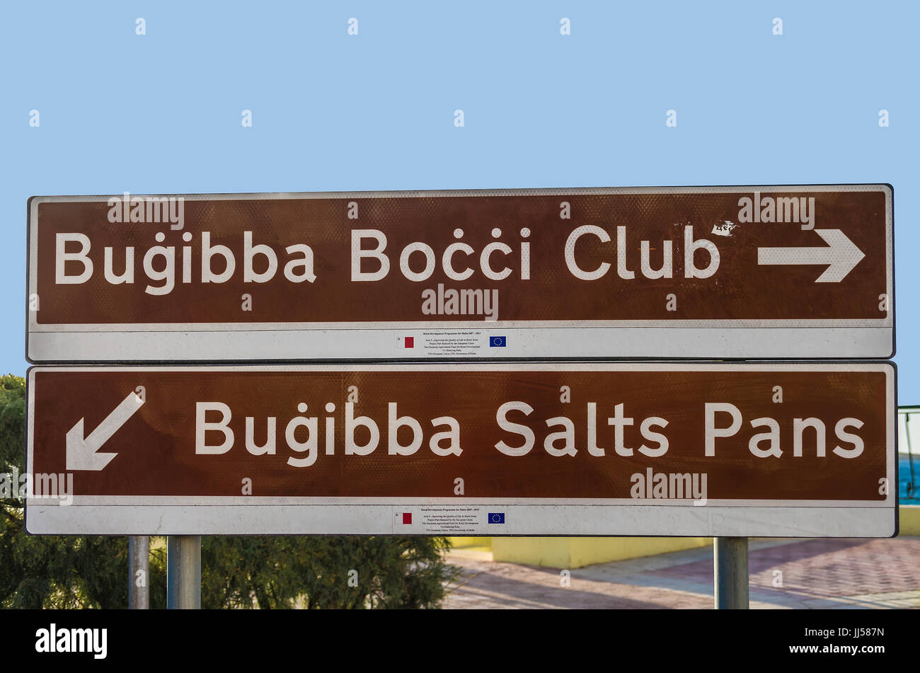 Malta, Bugibba: Road sign showing the way to some popular tourist. Stock Photo