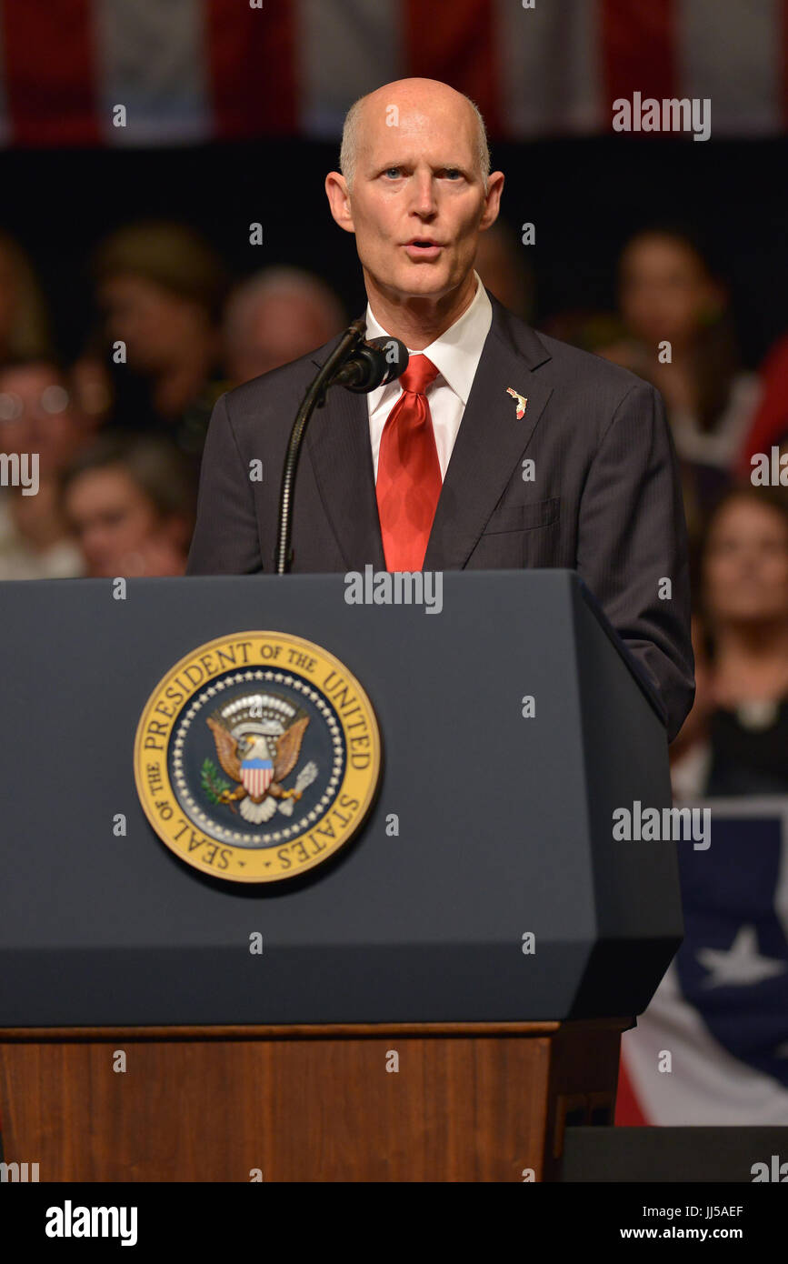 U.S. President Donald Trump delivers remarks to a crowd of people and ...