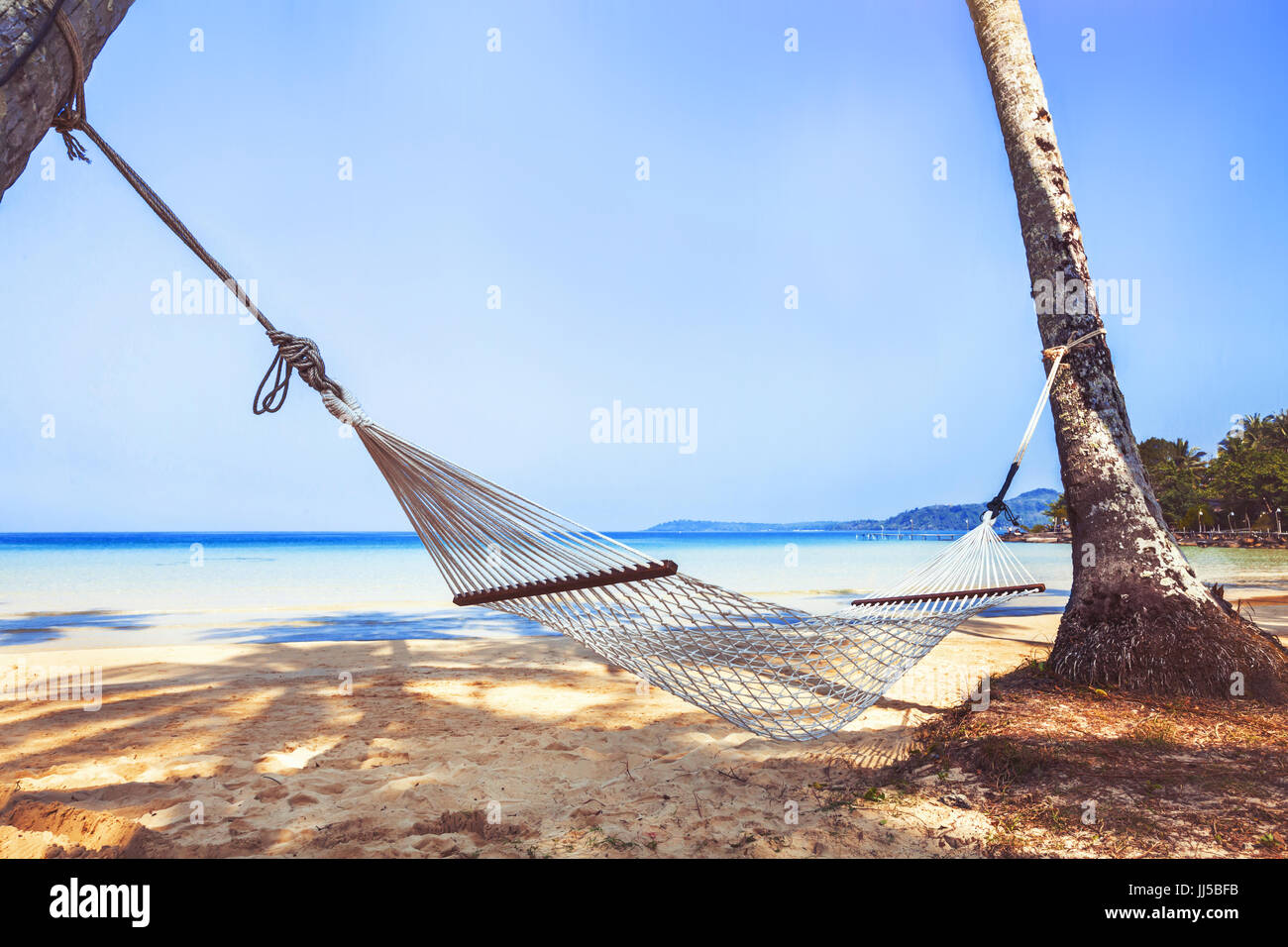 hammock on paradise beach, holidays on tropical island Stock Photo