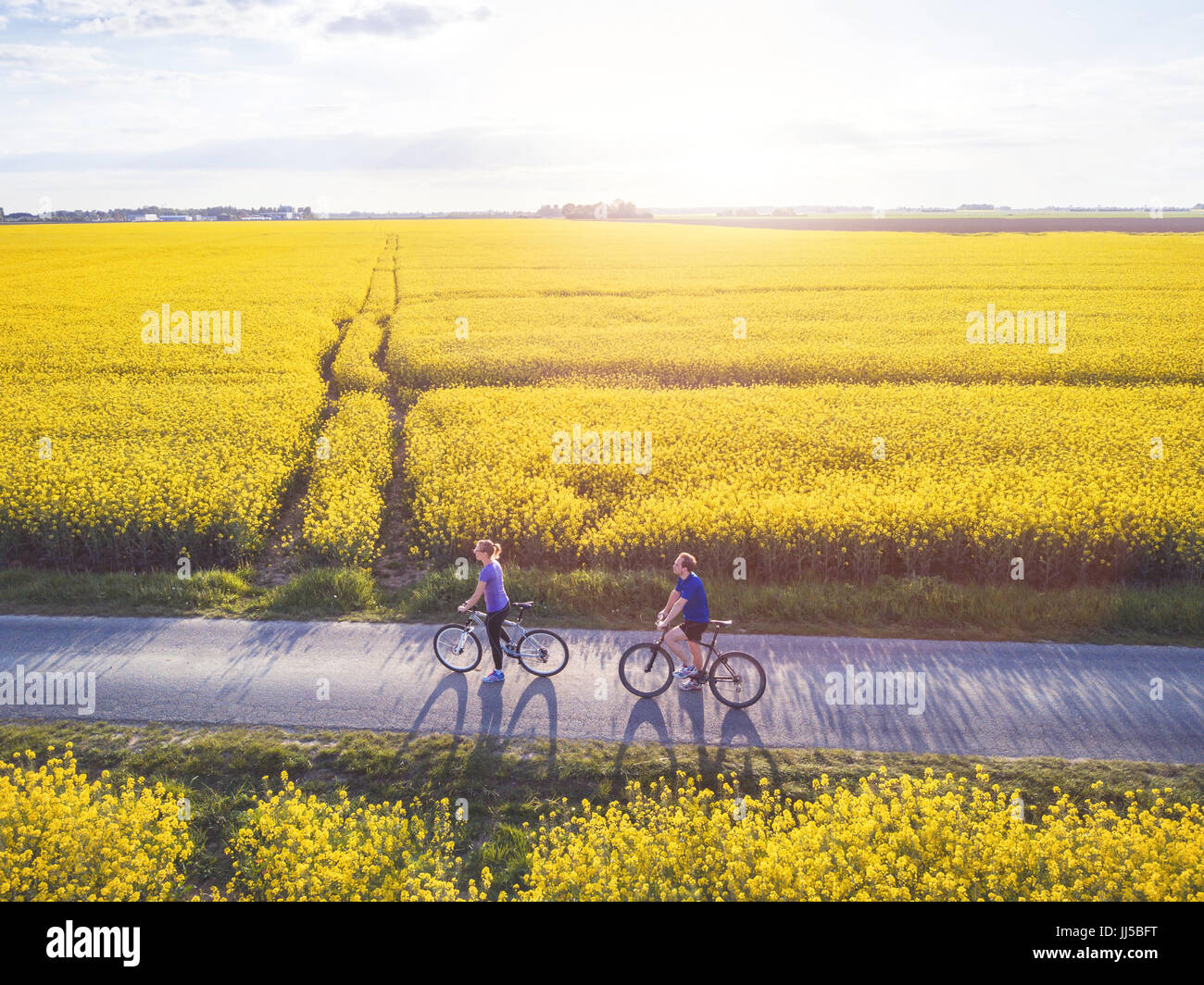cycling, group of young people with bicycles, aerial view Stock Photo
