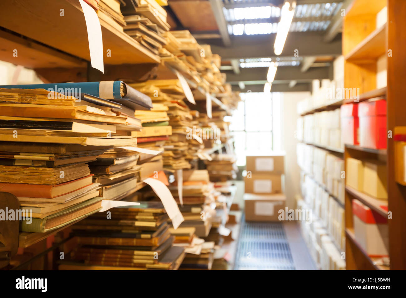 archive storage, old documents and books stored in the library Stock Photo