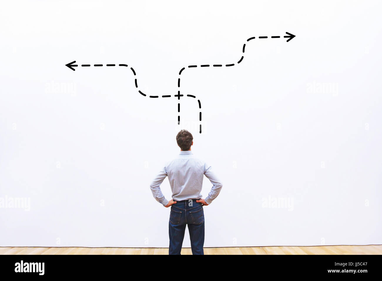 business strategy or decision making concept,  pensive businessman choosing direction Stock Photo