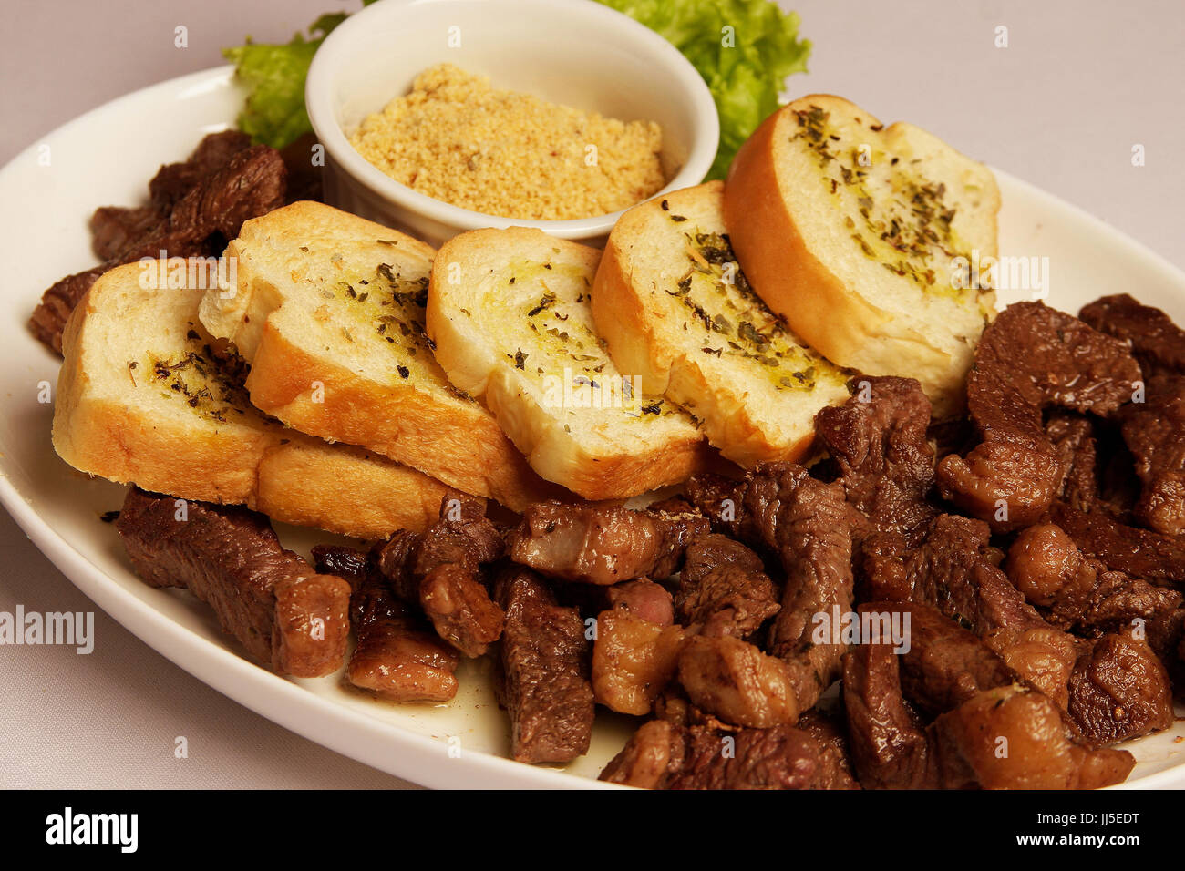 Steak, meat, beef, filet, salad, bread, rib, barbecue, Brazil Stock Photo