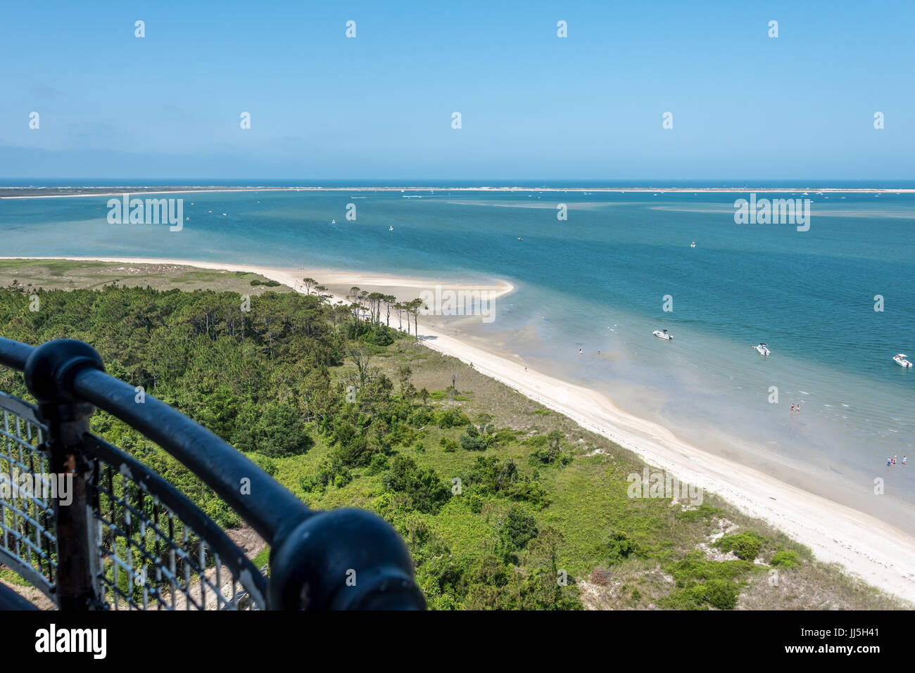 View from Cape Lookout Lighthouse above white sand beach of Crystal Coast shoreline in North Carolina's southern outer banks, beautiful blue water. Stock Photo