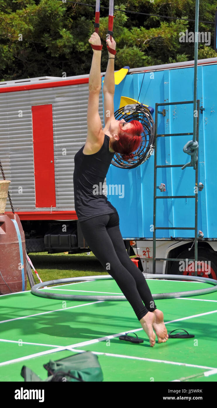 Christchurch, New Zealand - January 21, 2013: Fuse Circus performer practicing before the Campground Chaos show at the 20th World Buskers Festival on  Stock Photo