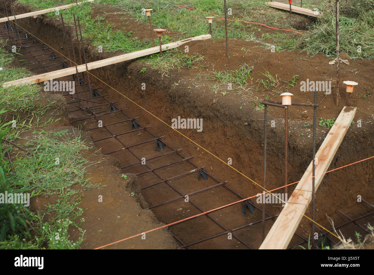 underground wire for foundation prep work before concrete pouring Stock Photo