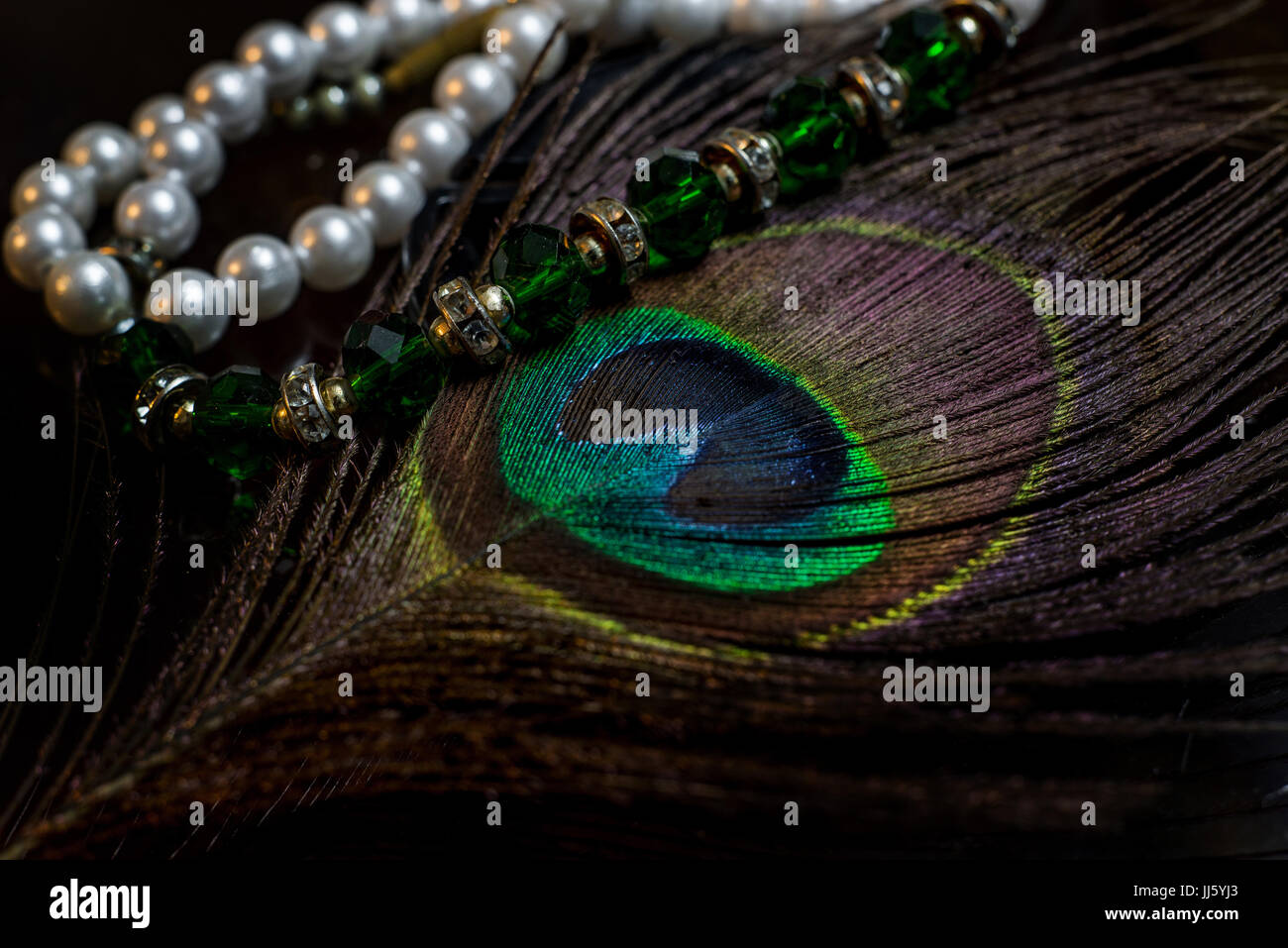 Pearls Emeralds and Peafowl Feathers Stock Photo Alamy