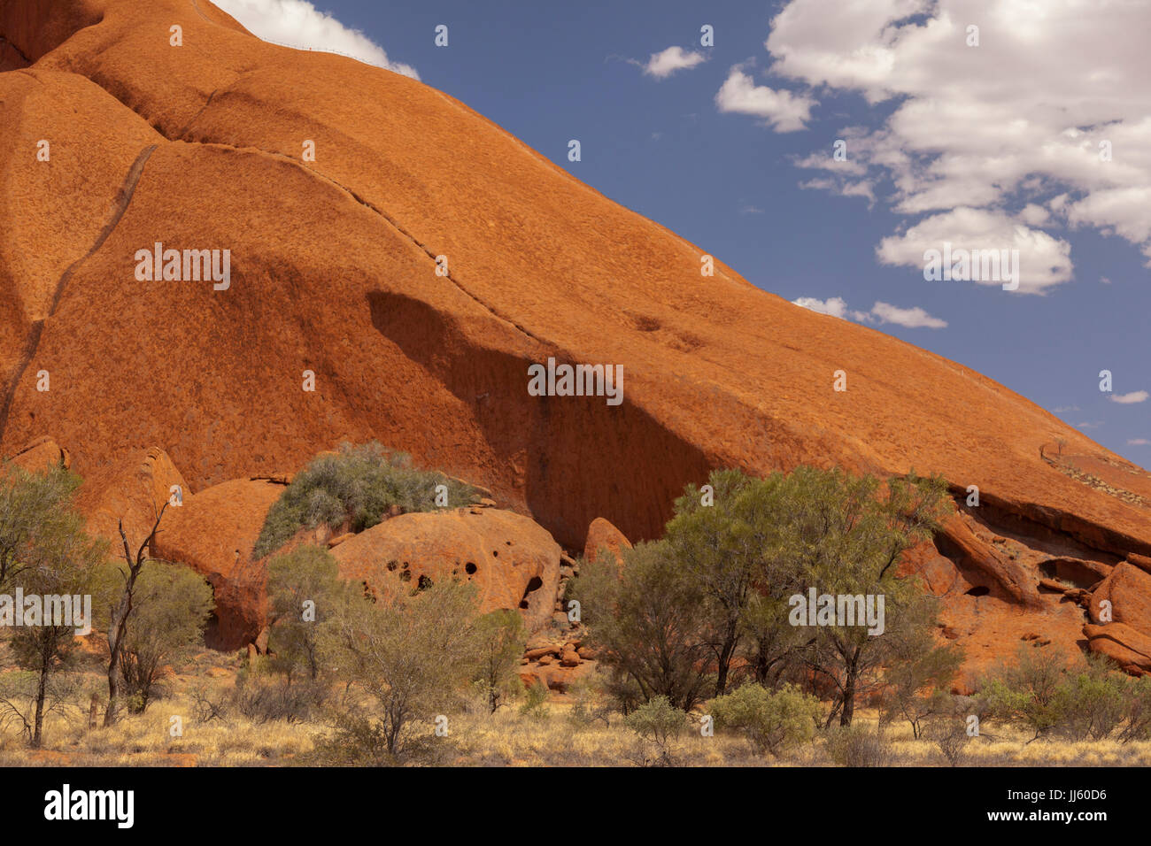 Uluru, (Ayers Rock), close up views of the different areas around Uluru, rock gardens, water holes, paths, rock caves, water fall trails, vegetation i Stock Photo