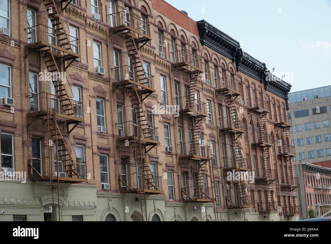 New York apartment building with exterior fire escape Stock Photo