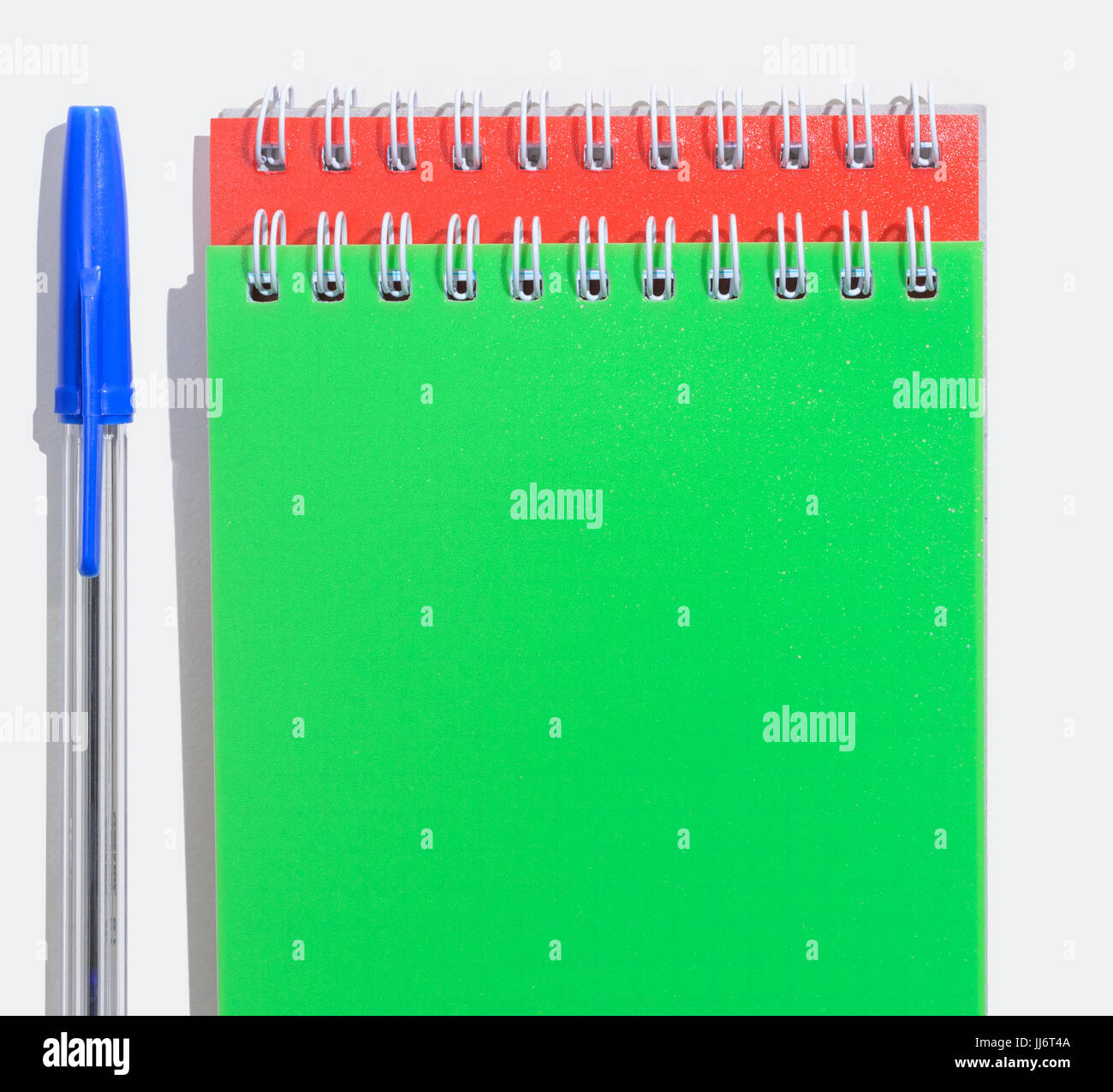 Green and red notepads Stock Photo