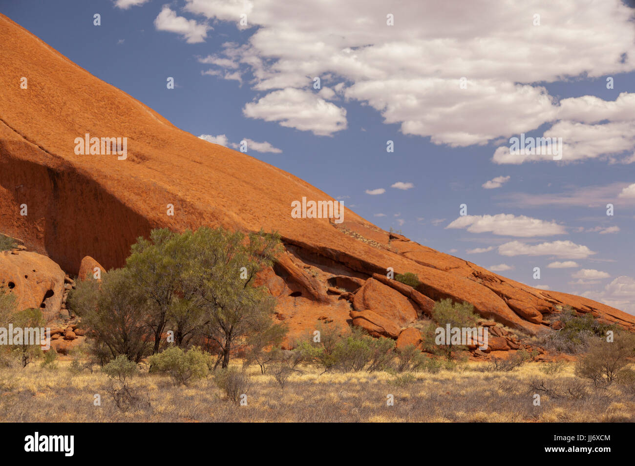 Uluru, (Ayers Rock), close up views of the different areas around Uluru, rock gardens, water holes, paths, rock caves, water fall trails, vegetation i Stock Photo