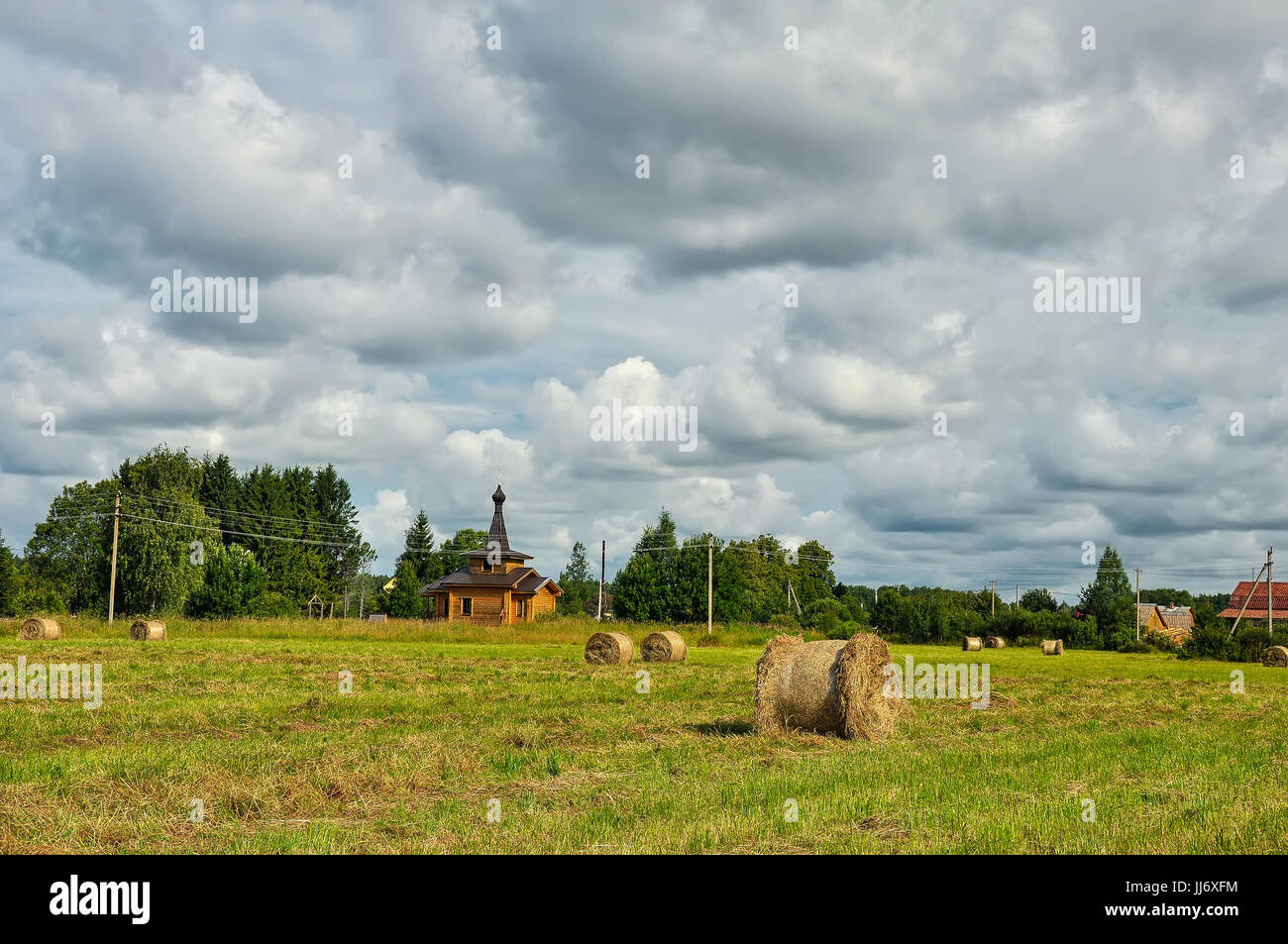 Summer rural landscape with the temple. New Church Stock Photo - Alamy
