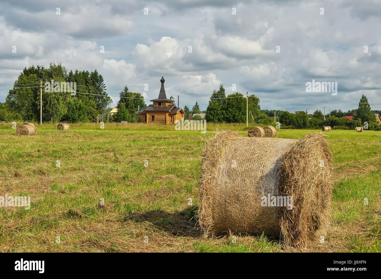 Summer rural landscape with the temple. New Church Stock Photo - Alamy