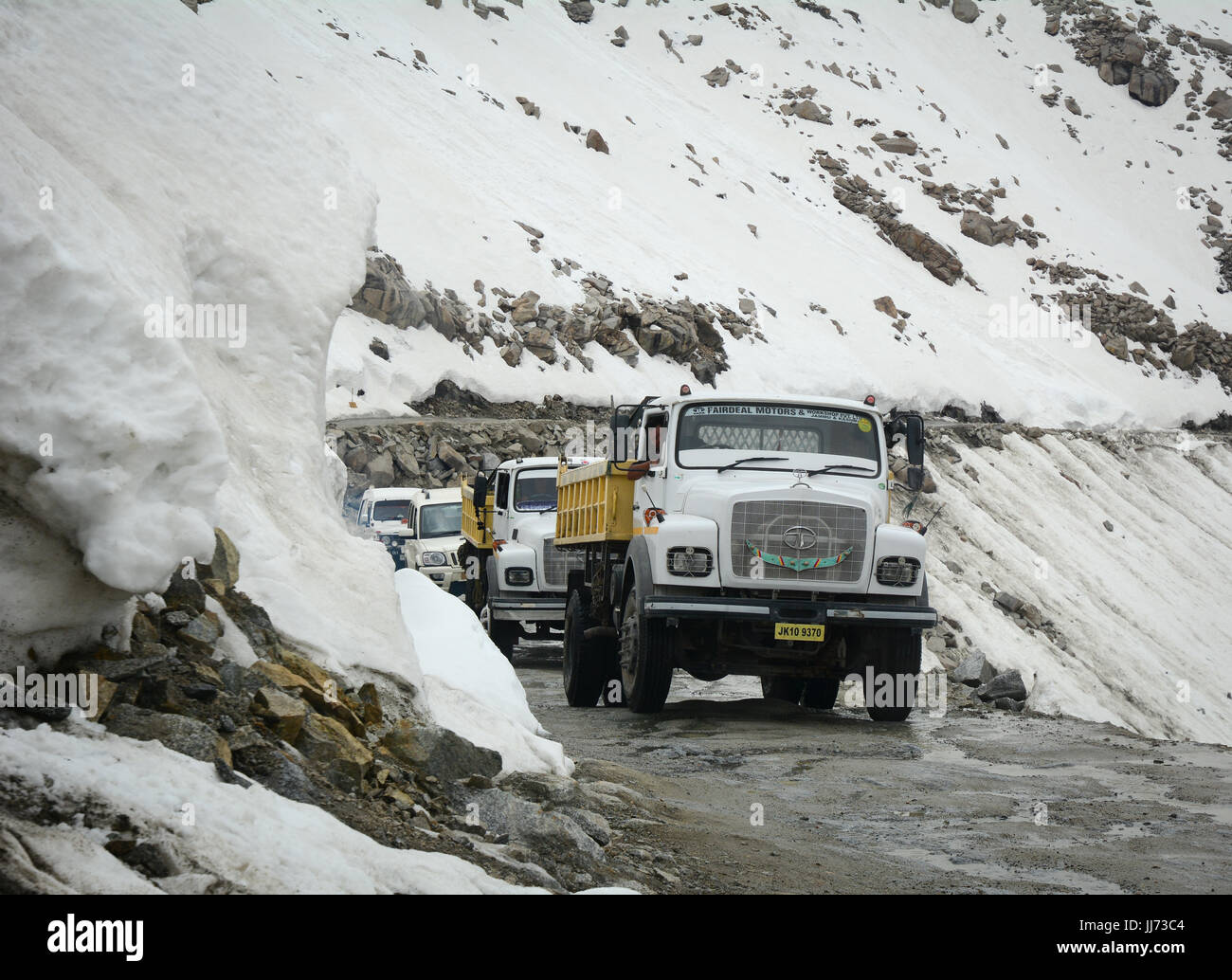 Ladakh, India Jul 18, 2015. Trucks run on dangerous mountain road in