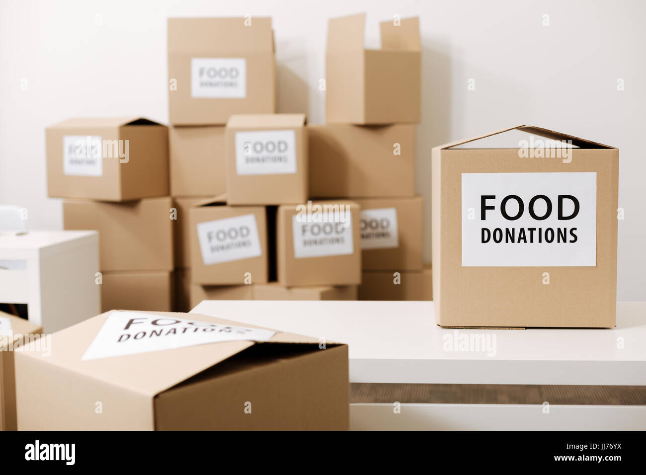 Grey boxes with food for those in need Stock Photo Alamy