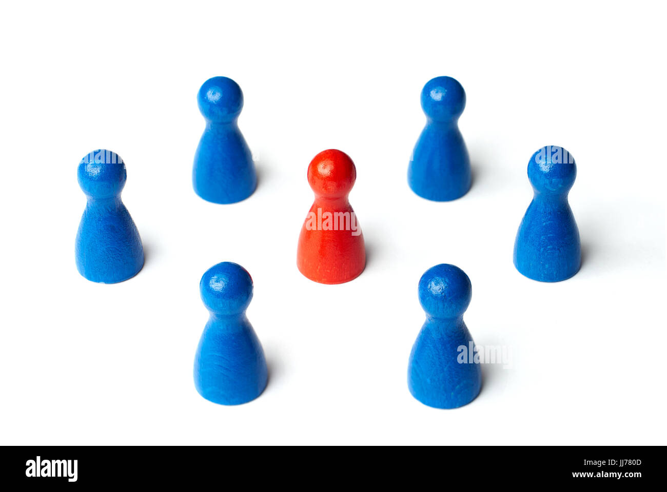 Red figure in the middle of 6 figures. Business concept for leadership, teamwork or groups. Isolated on white background. Stock Photo