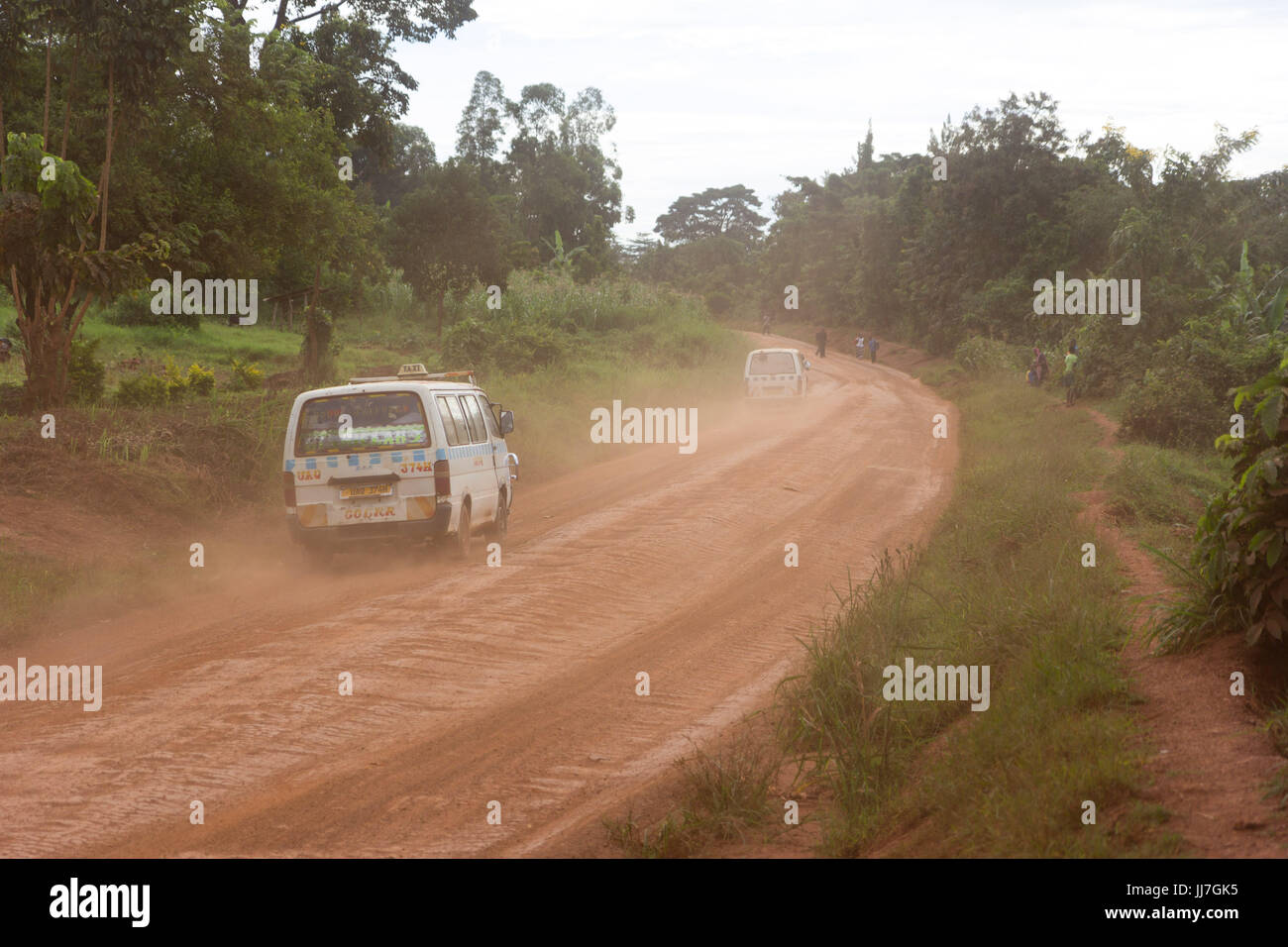 Buikwe, Uganda, 17 May 2017. A taxi car 'matatu' dashing on a dirt road Stock Photo