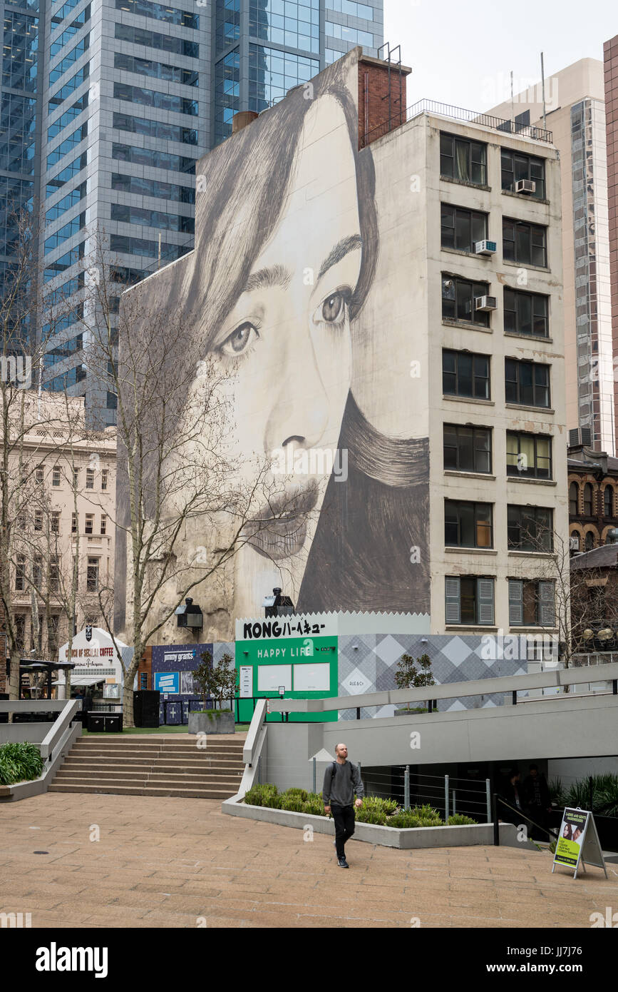 Street art painted on building wall, in central business district (CBD