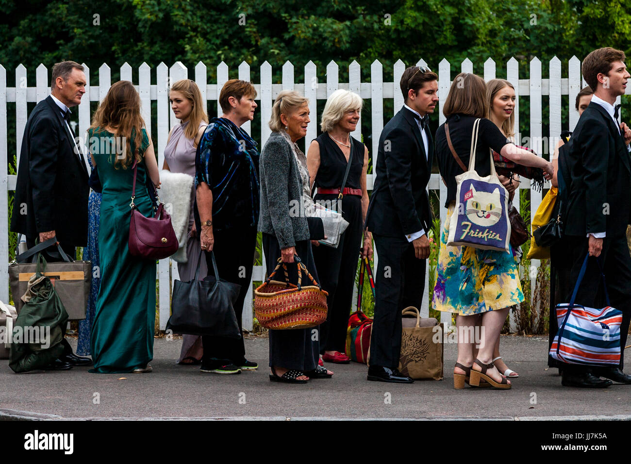 Opera fans with their picnic baskets arrive at Lewes railway station en
