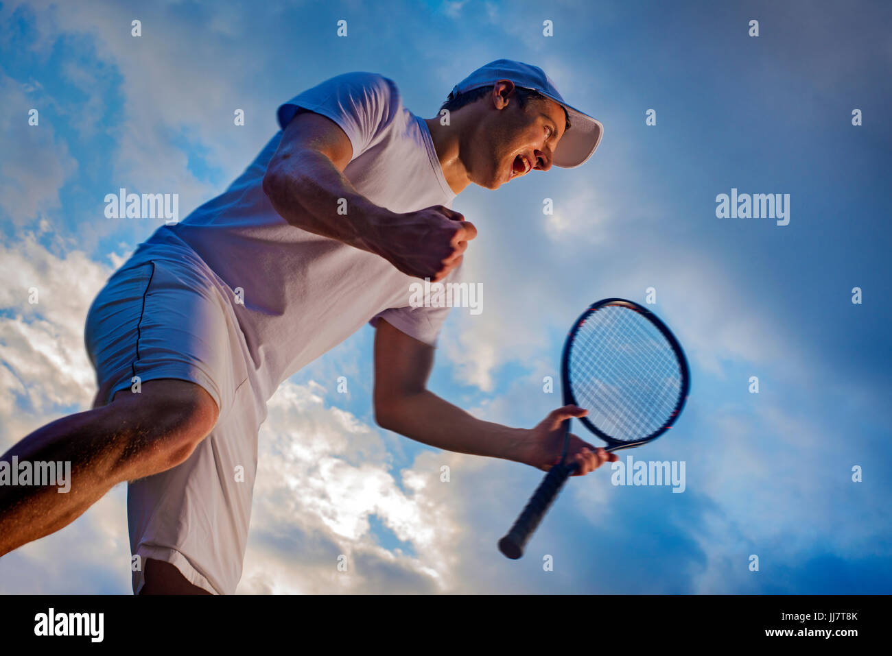 Winning Tennis player, happy screaming Stock Photo Alamy