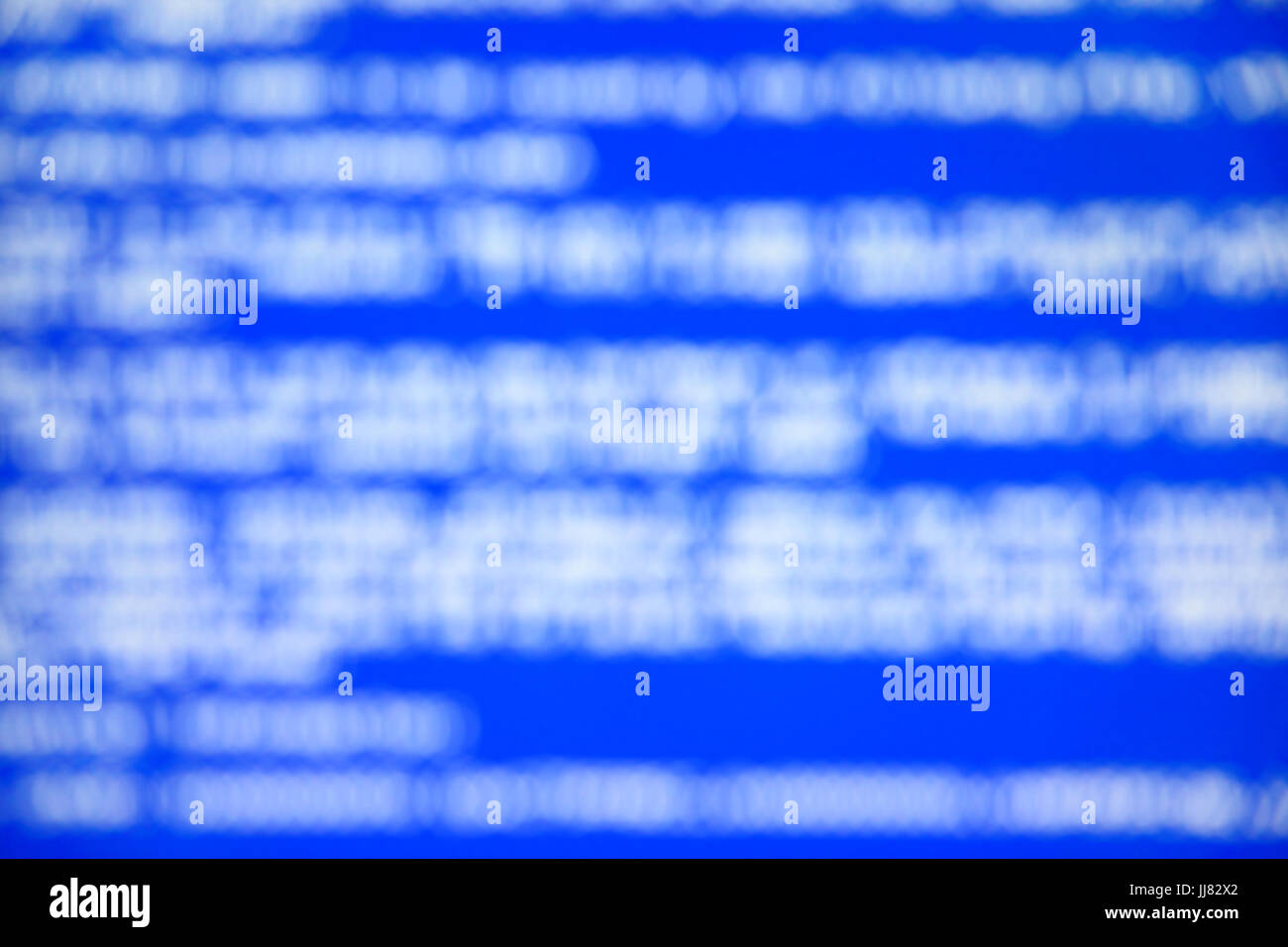 Blue screen of system crash report. Defocused background Stock Photo