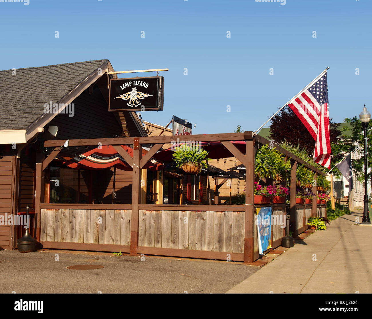 Liverpool, New York, USA. July 18, 2017. Exterior of the  Limp Lizard  Bar and Grill in the village of Liverpool, New York before opening . Popular ba Stock Photo